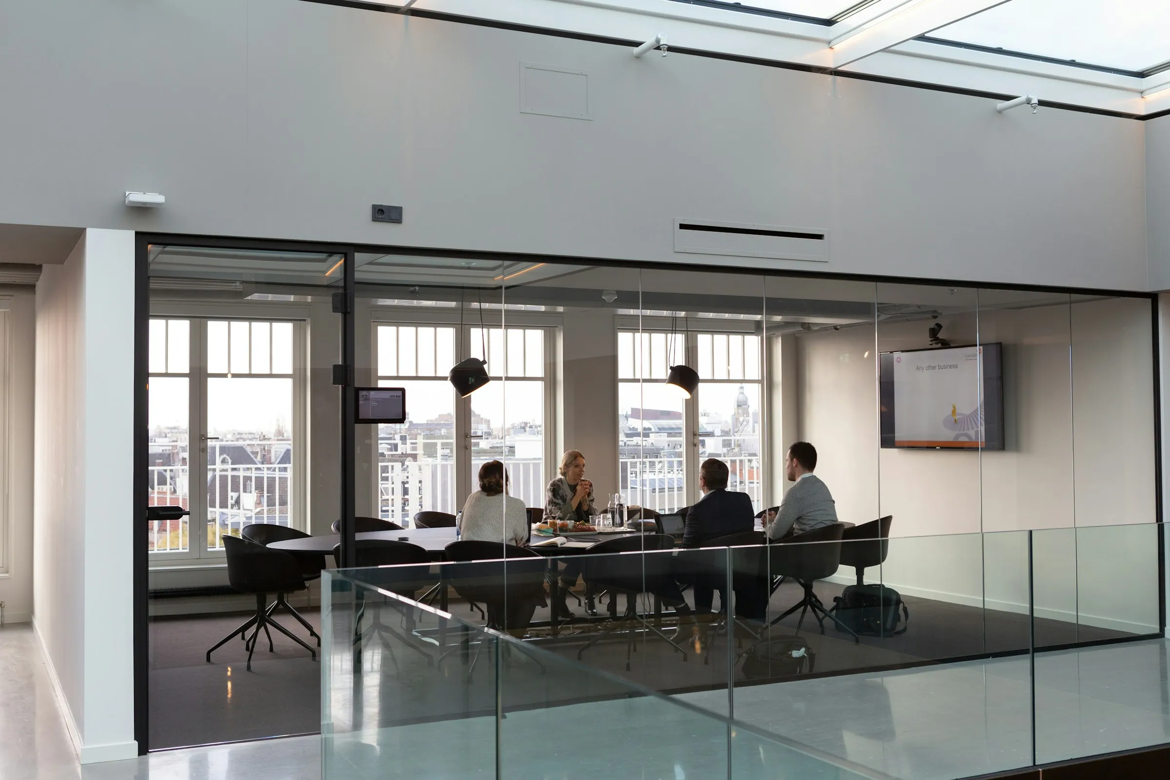 A management team around a boardroom table